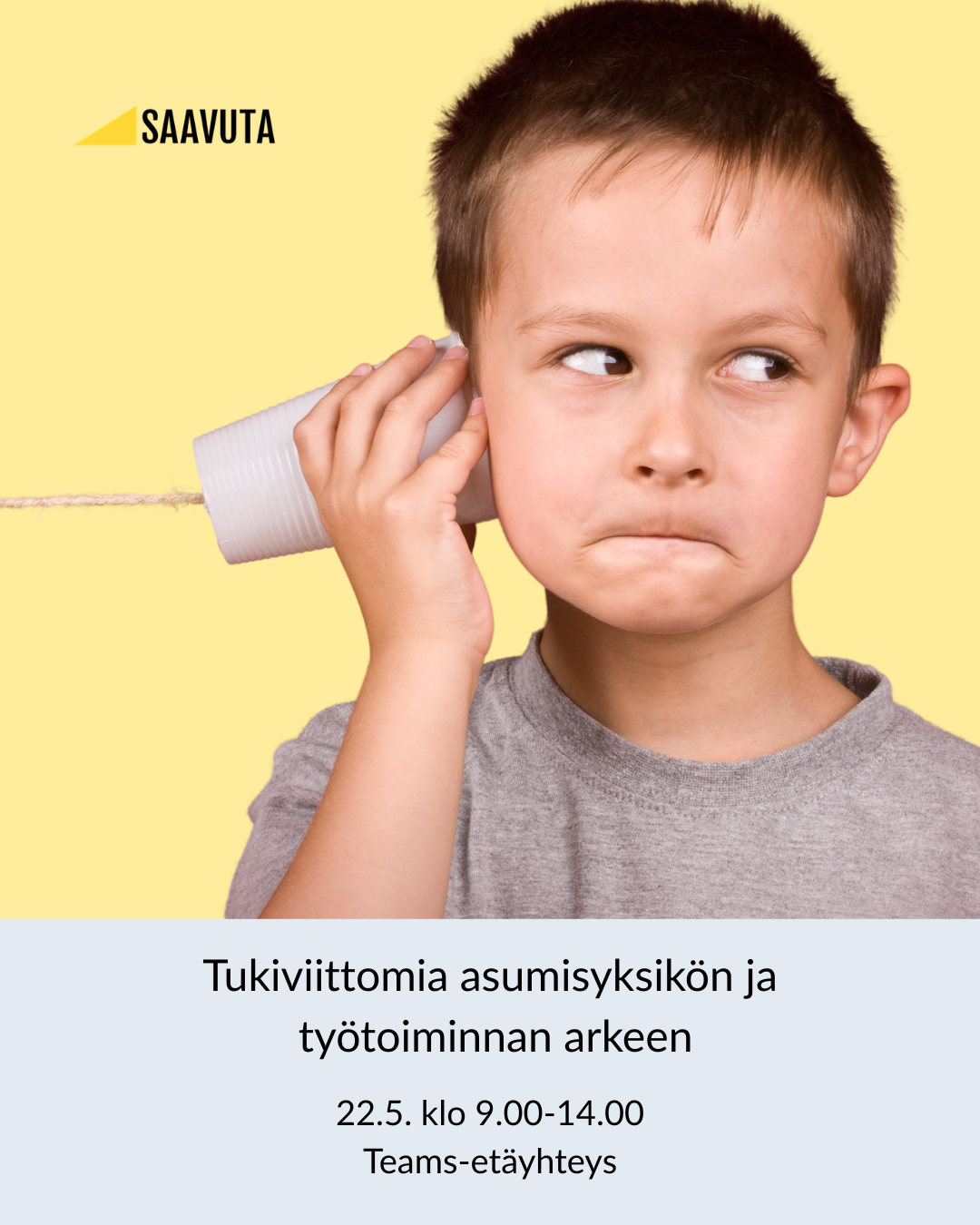 Poika kuuntelee lankapuhelimella